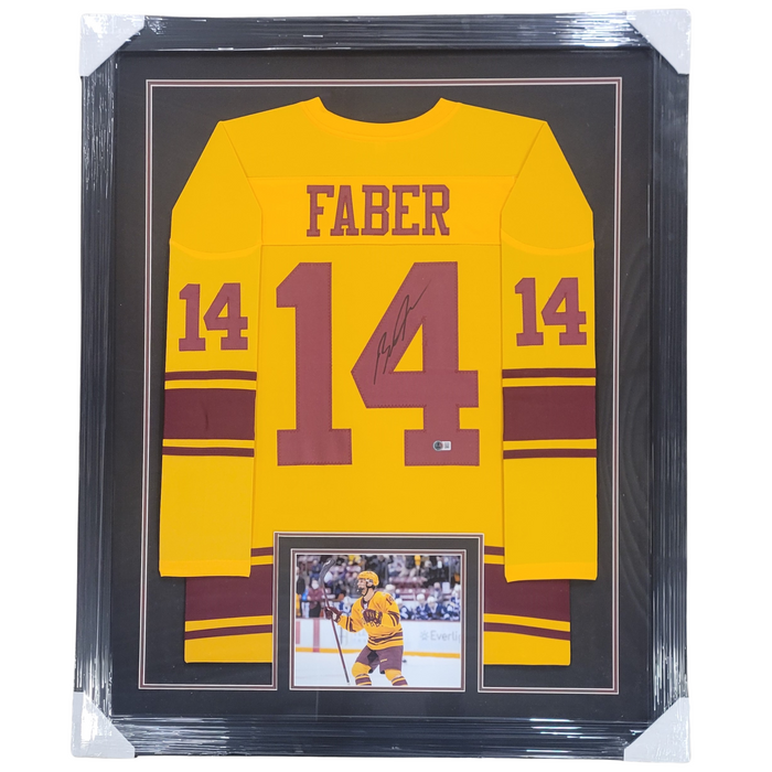 Brock Faber Signed & Professionally Framed Player Gold College Hockey Jersey