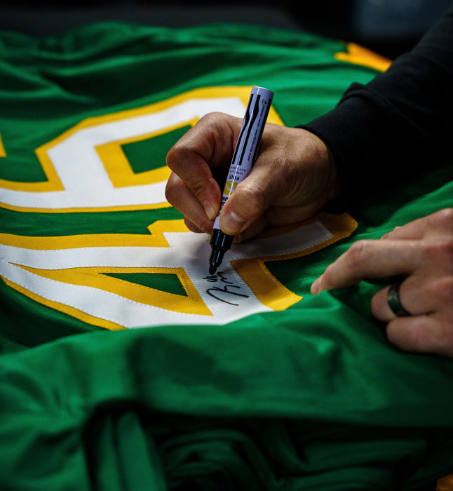 Jared Spurgeon Signed Green Retro Player Hockey Jersey